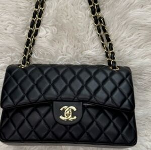 AUTHENTIC Chanel Black Quilted Shoulder Bag with Gold Accents